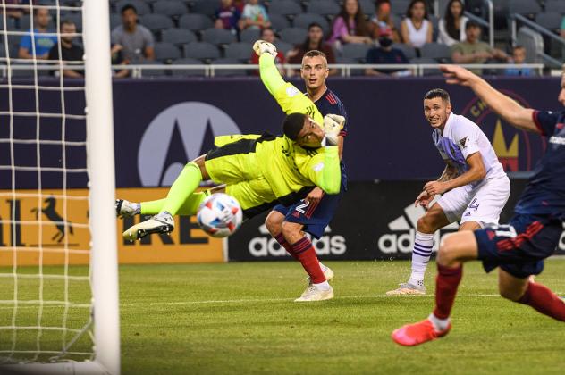 Chicago Fire FC fires a shot past Orlando City SC