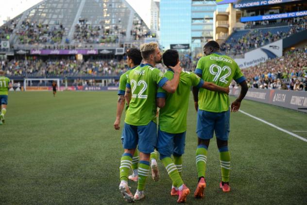 Seattle Sounders FC react after a goal