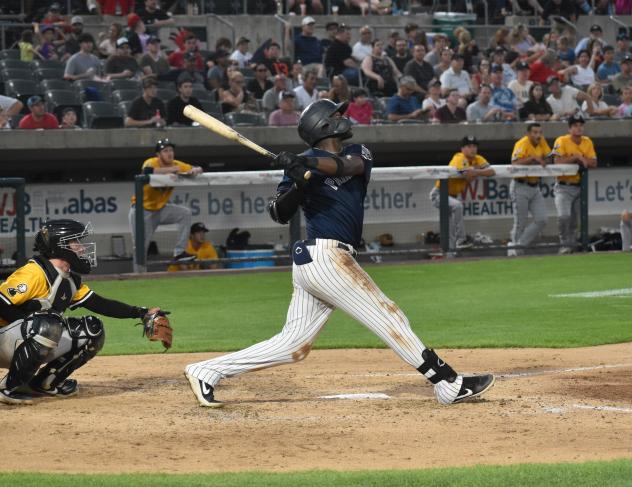 Michael Beltre swings away for the Somerset Patriots