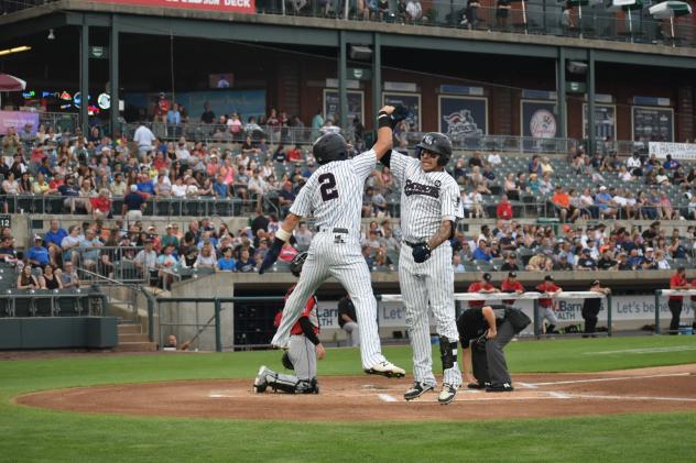 Somerset Patriots celebrate Donny Sands' two-run home run