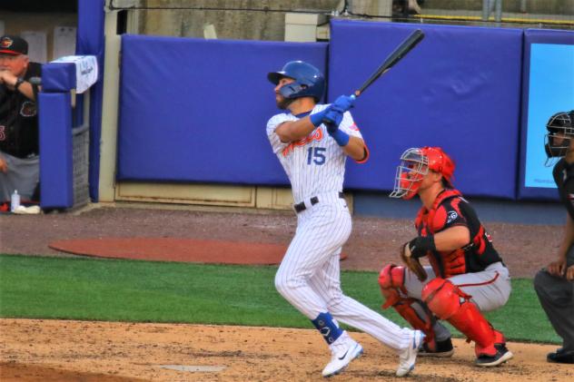 Drew Jackson of the Syracuse Mets watches his grand slam ball fly over the fence on Thursday night