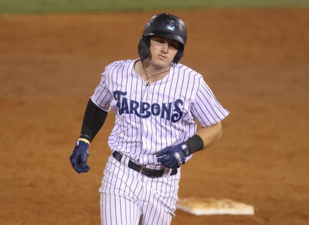 Trevor Hauver of the Tampa Tarpons rounds the bases following his home run