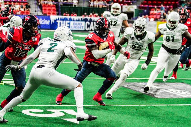 Sioux Falls Storm running Back Nate Chavious carries the ball against he Green Bay Blizzard