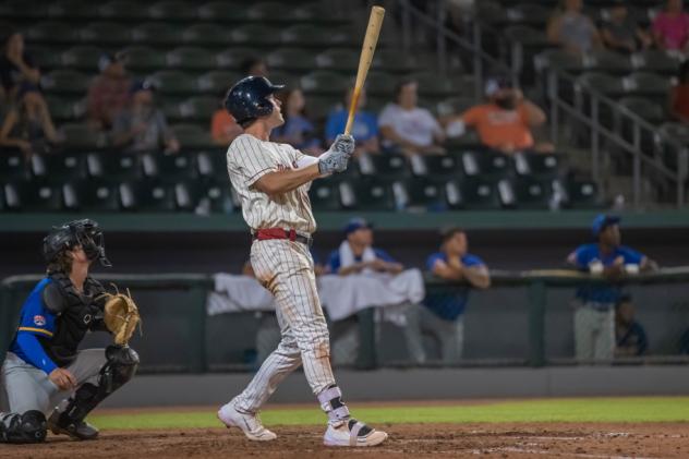 Kansas City Monarchs first baseman Casey Gillaspie launches his 15th home run of the season against the Houston Apollos