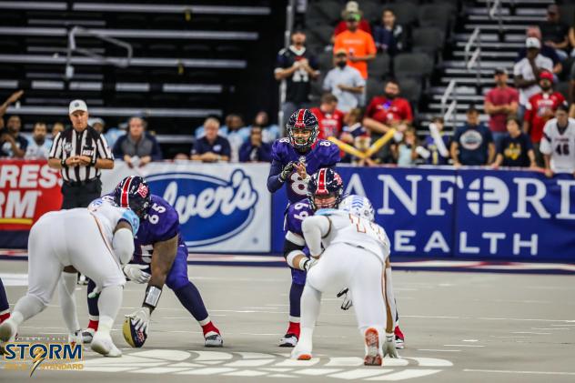 Sioux Falls Storm quarterback Lorenzo Brown awaits the snap against the Frisco Fighters