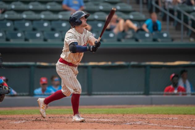 Morgan McCullough drives a triple to right center to give the Kansas City Monarchs the lead over the Chicago Dogs