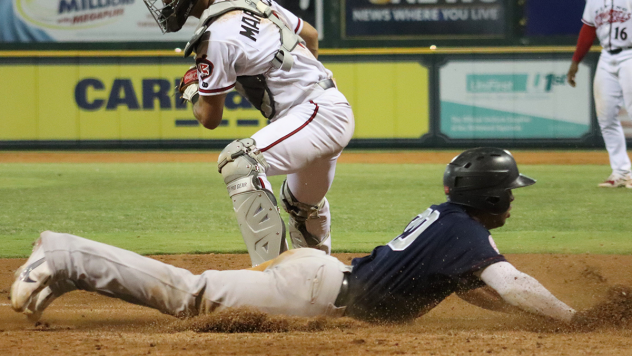 Oswald Peraza slides home for the Somerset Patriots
