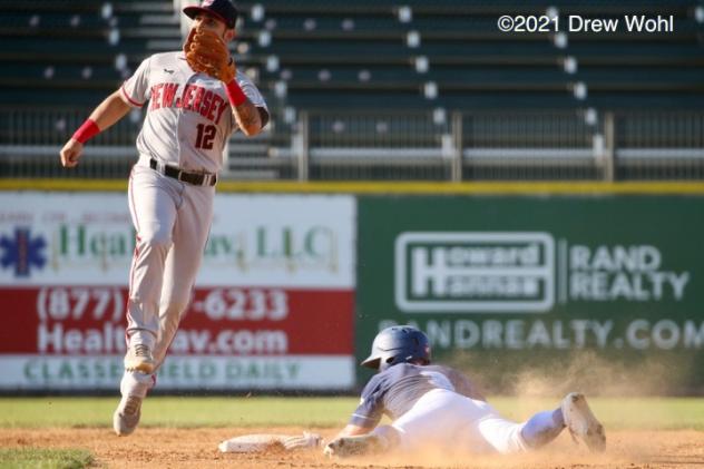 New York Boulders Jack Sundberg slides safely into second base with a stolen base against the New Jersey Jackals