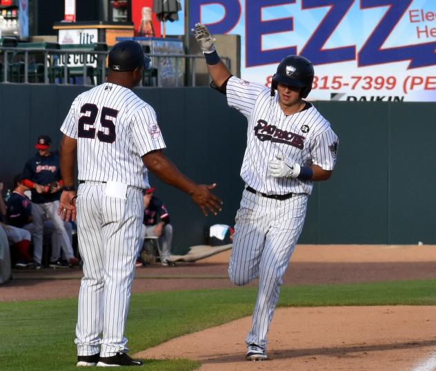 Chad Bell of the Somerset Patriots rounds the bases after his home run