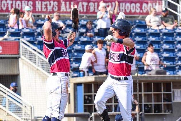 Griffin Conine of the Pensacola Blue Wahoos celebrates a homer