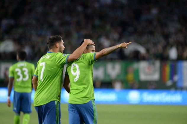 Cristian Roldan and Raúl Ruidíaz of Seattle Sounders FC