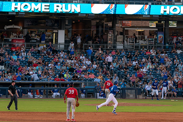 Devin Mann jogs around second base after hitting in seventh home of the season in the Tulsa Drillers 9-4 win
