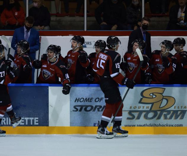 Vancouver Giants right wing Jaden Lipinski gets congratulations from the bench vs. the Kamloops Blazers