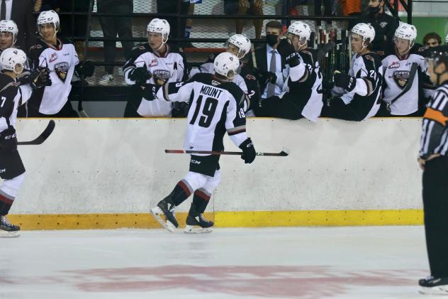 Vancouver Giants right wing Payton Mount receives congratulations after a goal against the Prince George Cougars