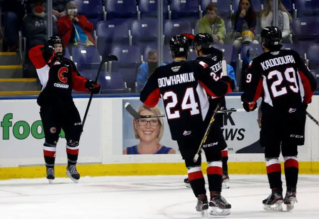 Prince George Cougars react after a goal vs. the Victoria Royals