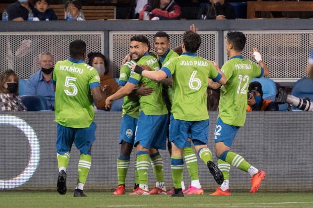 Seattle Sounders FC celebrate a goal against the San Jose Earthquakes