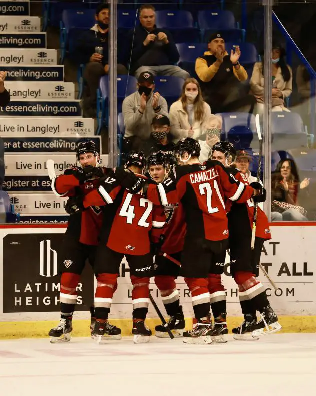 Vancouver Giants celebrate a goal against the Prince George Cougars