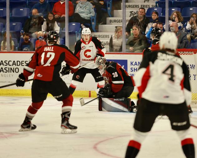 Prince George Cougars take a shot against the Vancouver Giants