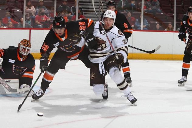 Lehigh Valley Phantoms defenseman Wyatte Wylie (left) vs. the Hershey Bears