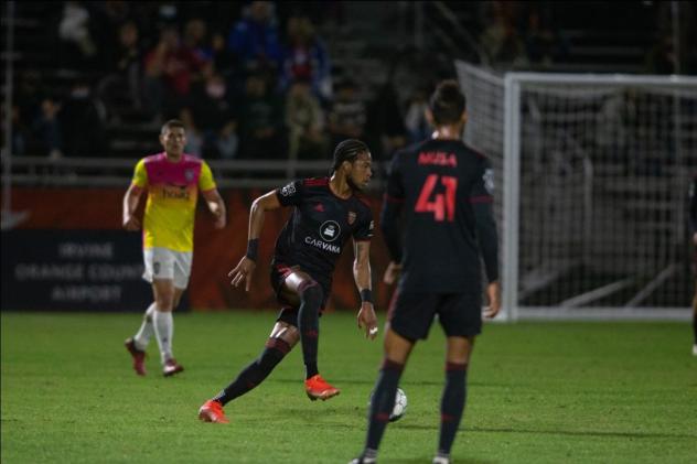 Phoenix Rising FC hunts for a scoring opportunity against Orange County SC