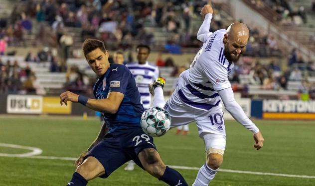 Brian Ownby of Louisville City FC (right) battles the Indy Eleven