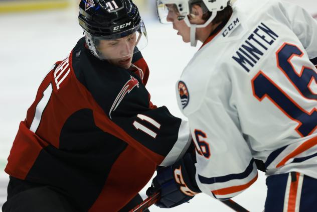 Vancouver Giants right wing Fabian Lysell (right) vs. the Kamloops Blazers