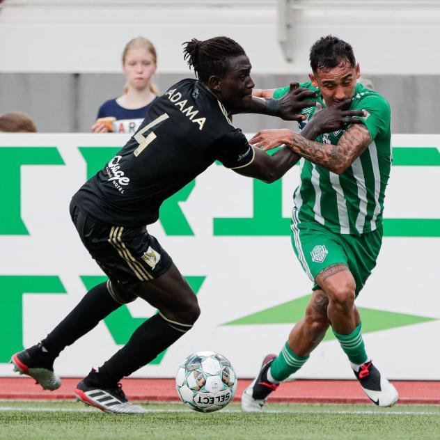 FC Tulsa defender Mo Jadama (left) vs. OKC Energy FC