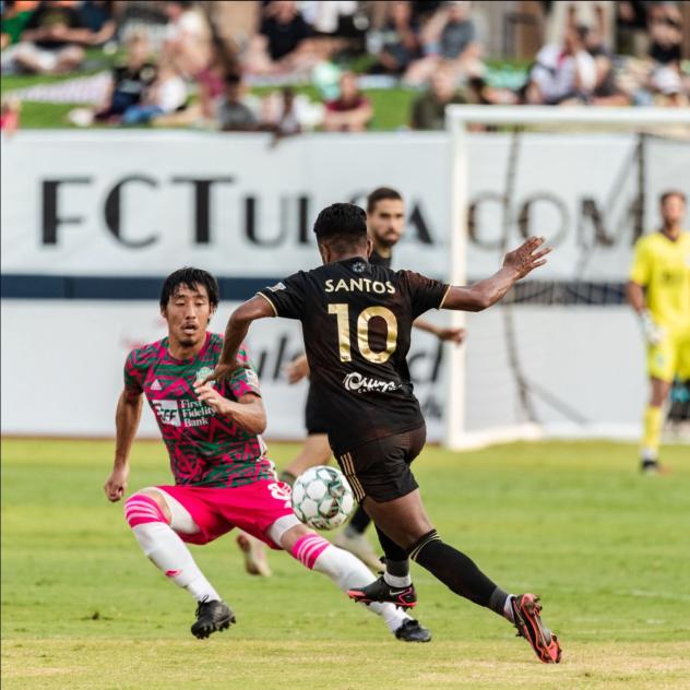 FC Tulsa forward Marlon Santos (right) vs. OKC Energy FC