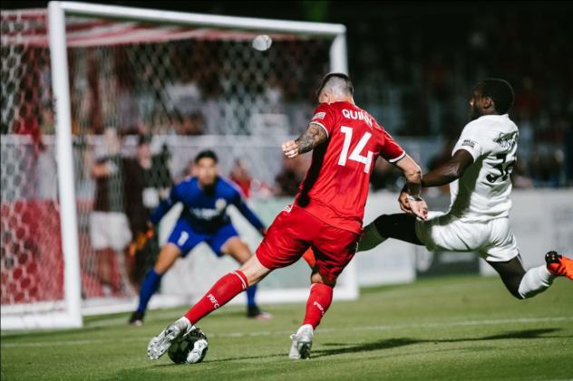 Phoenix Rising FC midfielder Aodhan Quinn eyes the net vs. Sacramento Republic FC