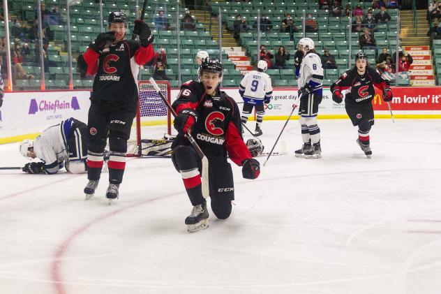 Prince George Cougars left wing Carter MacAdams celebrates a score against the Victoria Royals