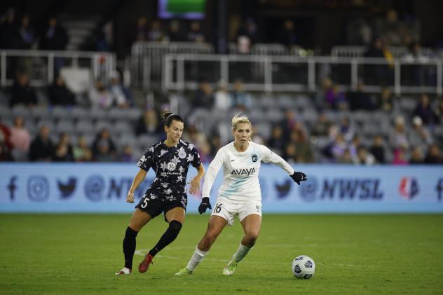 NJ/NY Gotham FC midfielder Allie Long (right) vs. Racing Louisville FC