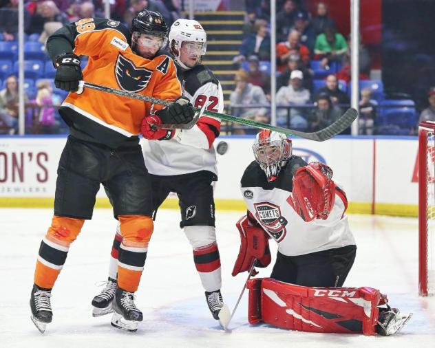 Lehigh Valley Phantoms left wing Garrett Wilson tries to direct a puck vs. the Utica Comets