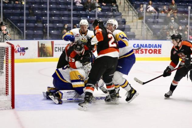 Medicine Hat Tigers and Saskatoon Blades pileup