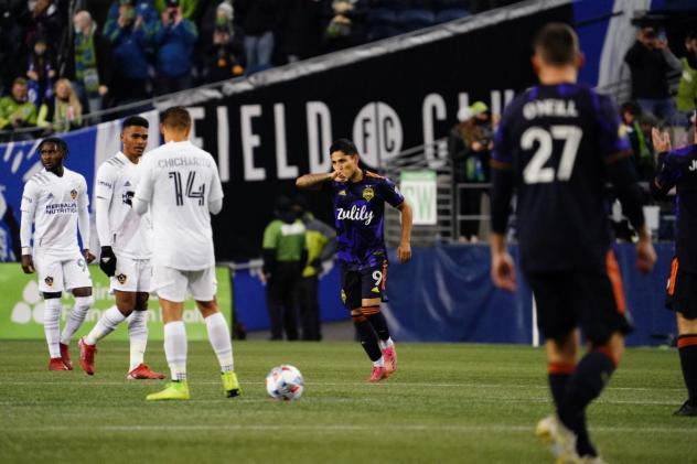 Seattle Sounders FC forward Raul Ruidiaz (center) vs. the LA Galaxy