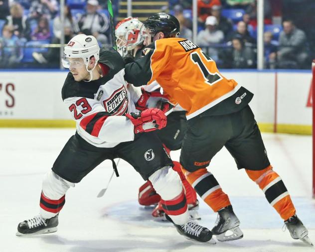 Lehigh Valley Phantoms center German Rubtsov (right) battles the Utica Comets