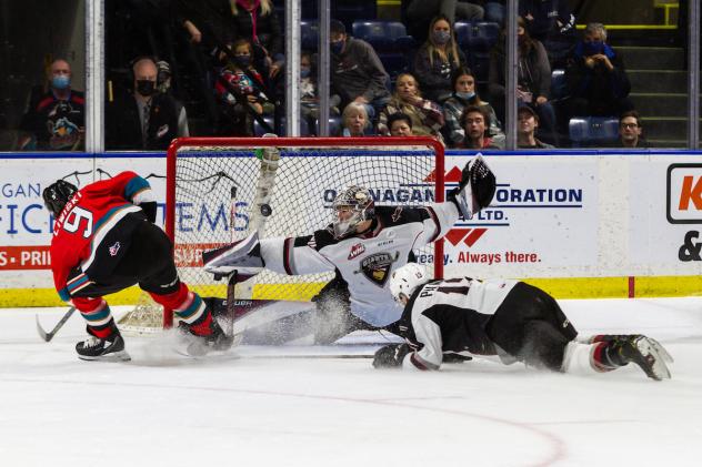 Vancouver Giants goaltender Jesper Vikman stretches to make a save vs. the Kelowna Rockets