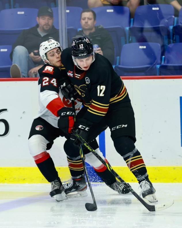 Vancouver Giants left wing Adam Hall vs. the Prince George Cougars