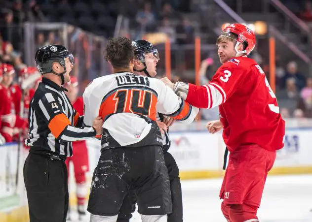 Allen Americans defenseman Darian Skeoch engages in a spirited discussion with the Fort Wayne Komets