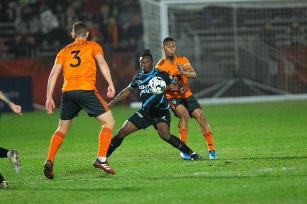 Colorado Springs Switchbacks FC eye the ball against Orange County SC