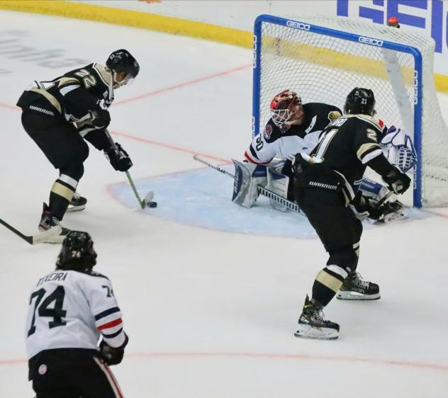 Wheeling Nailers forward Patrick Watling tees up a shot against the Indy Fuel