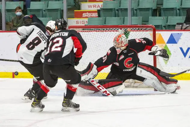 Prince George Cougars goaltender Tyler Brennan makes a save against the Vancouver Giants