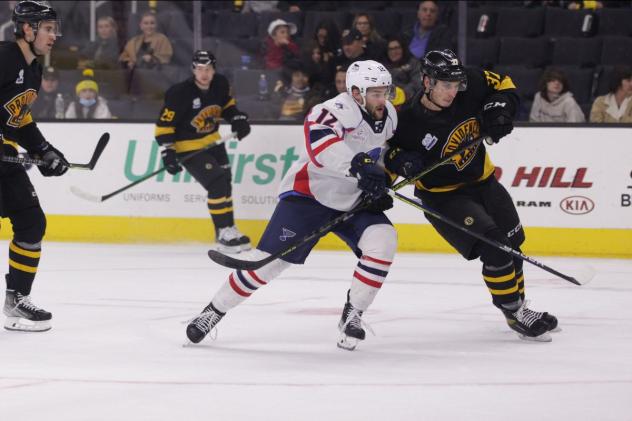 Springfield Thunderbirds left wing Nathan Walker (left) vs. the Providence Bruins