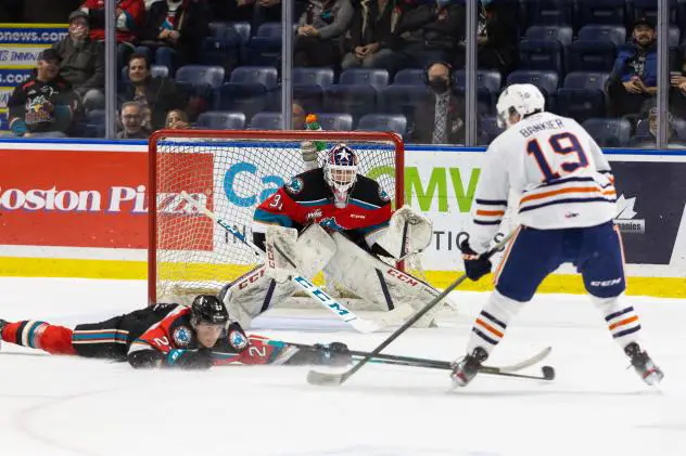 Kelowna Rockets goaltender Talyn Boyko faces a Kamloops Blazers shooter