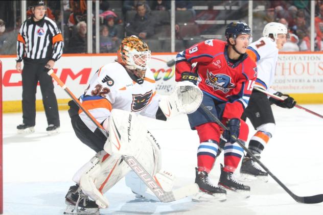 Springfield Thunderbirds left wing Mackenzie MacEachern in front of the Lehigh Valley Phantoms net