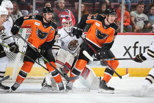 Lehigh Valley Phantoms center Cal O'Reilly (left) and left wing Isaac Ratcliffe vs. the Hershey Bears