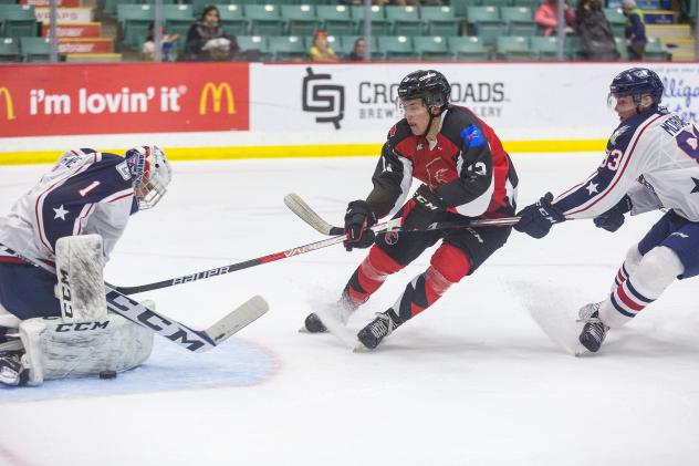 Prince George Cougars shoot against the Tri-City Americans