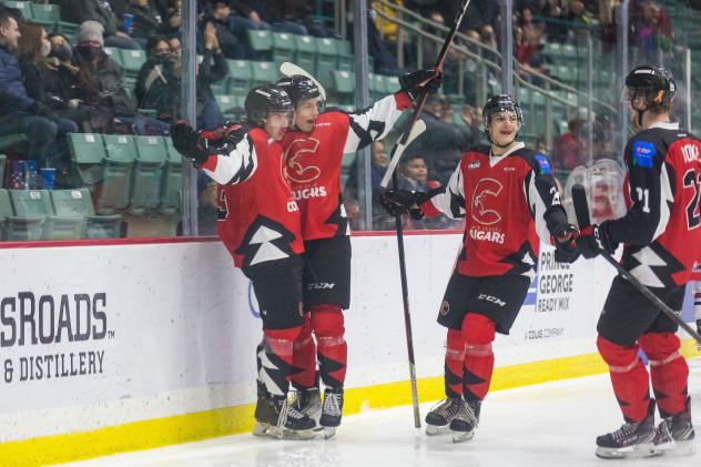 Prince George Cougars celebrate a goal against the Tri-City Americans