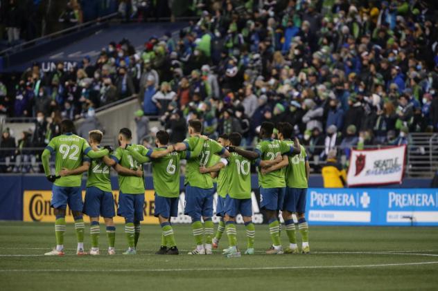 Seattle Sounders FC line up before their playoff crowd