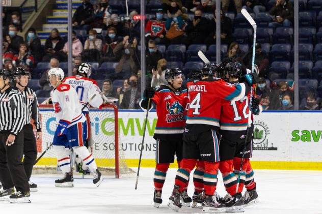 Kelowna Rockets celebrate a goal against the Spokane Chiefs