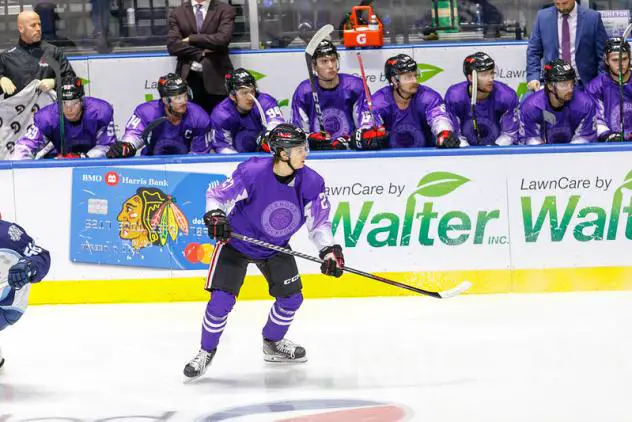 Rockford IceHogs in their Hockey Fights Cancer jerseys